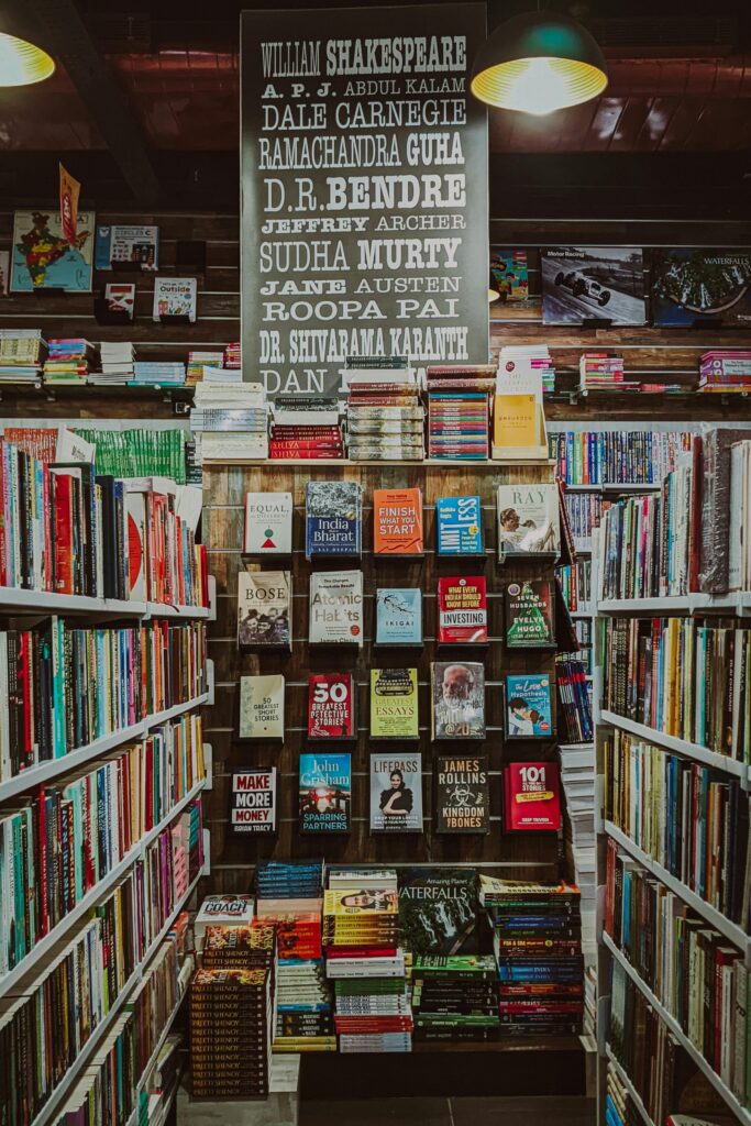 Explore a warm and inviting bookstore in Bengaluru, India, showcasing diverse books and wooden shelves.